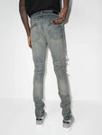 Amiri PJ Thrasher Distressed Effect Ripped Jeans in Blue