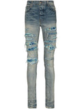 Amiri PJ Thrasher Distressed Effect Ripped Jeans in Blue